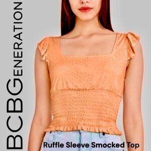 BCBGENERATION Ruffle Strap Smocked Top In Coral